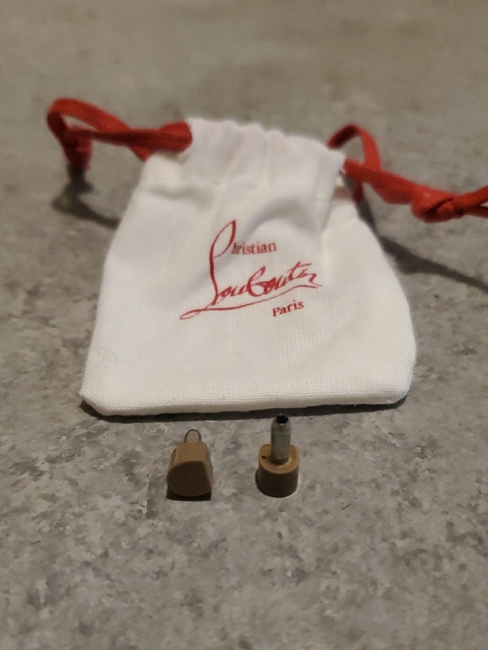 Christian Louboutin Heel Taps